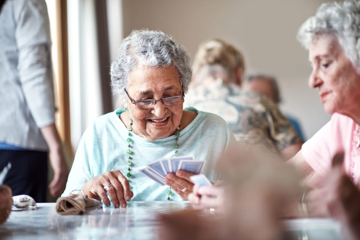 Resident playing cards at Crystal Terrace of Klamath Falls in Klamath Falls, Oregon