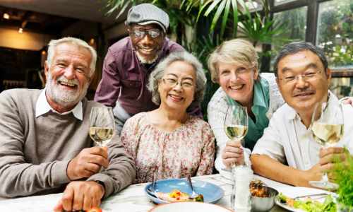 Resident couples having wine at an event at The Barclay in Charlottesville, Virginia