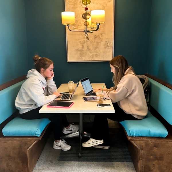 Residents studying in the lounge at The Quarters at Bloomington in Bloomington, Indiana