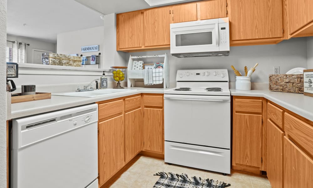 Kitchen with bright cabinets at The Remington Apartments in Wichita, Kansas