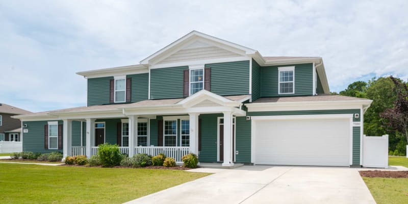 A home with an attached garage at Heroes Manor in Camp Lejeune, North Carolina