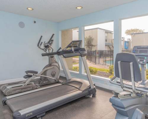 Community fitness center at Creekside Villas at Clear Lake Apartments in Houston,Texas