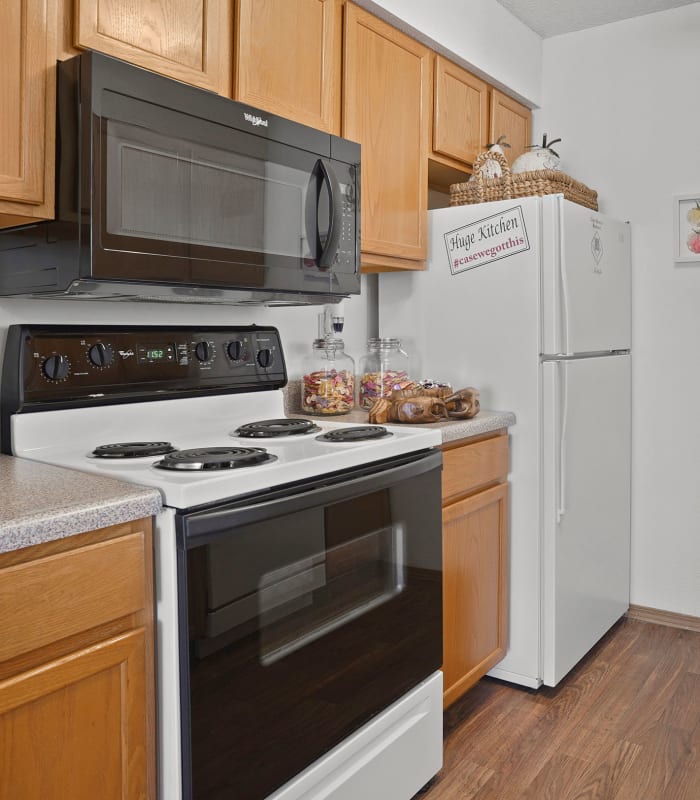 Kitchen with granite countertops at Huntington Park Apartments in Wichita, Kansas