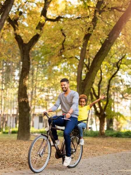 Resident family ride bike at Andover Park in Valparaiso, Indiana