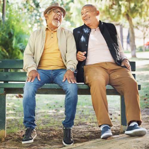 Residents laughing and talking at Broadway West in Brentwood, New York