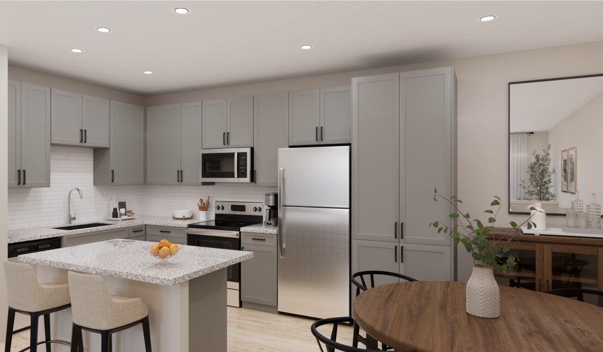 Hepburn floor plan kitchen with grey cabinets at Remington Lake Apartments in Hamilton, Ohio