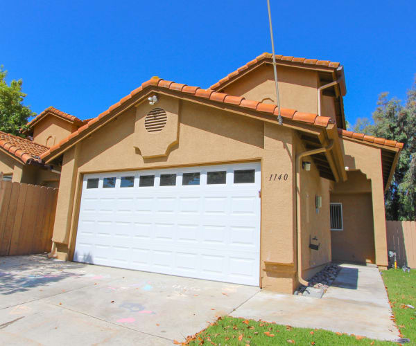Exterior of a home with a garage at Vista Ridge in Vista, California
