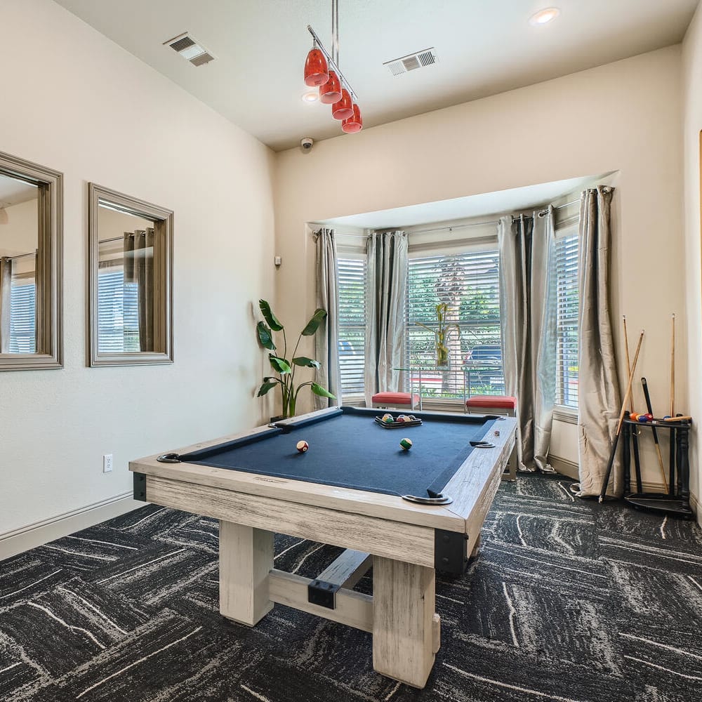 Home cinema and billiard table  at Grand Villas Apartments in Katy, Texas