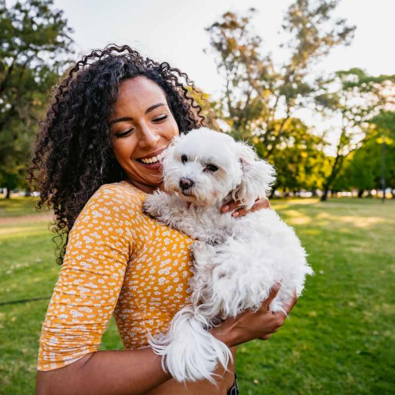 A happy dog with its person near Magnolia Run, Virginia Beach, Virginia