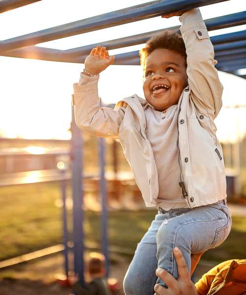 Kid playing in the play area at View at Blossom Hill in San Jose, California