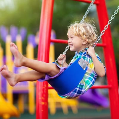 Resident kid at the community playground near Smoky Crossing, Seymour, Tennessee