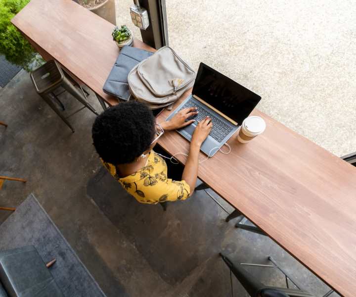 Resident working in a coffee shop near The Peak at Sky Mountain in Reno, Nevada