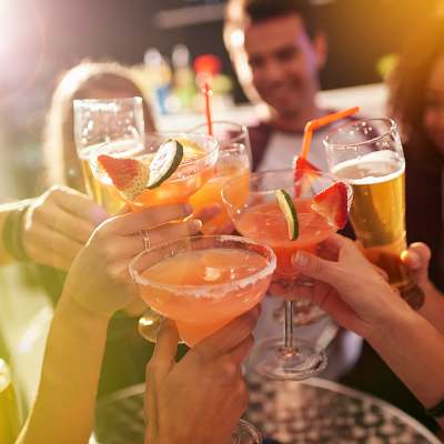 Friends having drinks at Anchor Apartments in Freeport, Florida, 