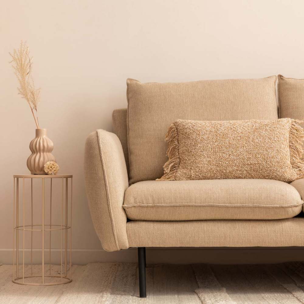 Comfortable couch with a small side table at Bana At Tujunga in Tujunga, California
