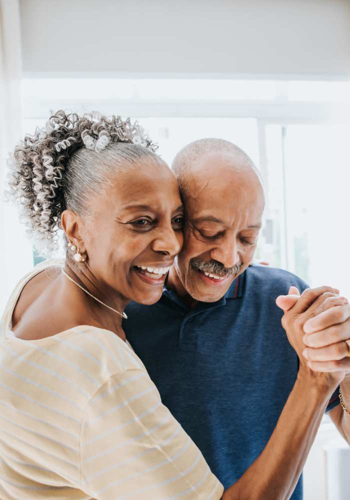Resident couple dancing at Villas East Hill in Pensacola, Florida