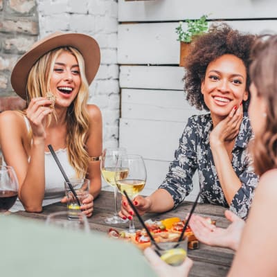 Resident friends out for wine and appetizers at their favorite spot near Vue Fremont in Fremont, California