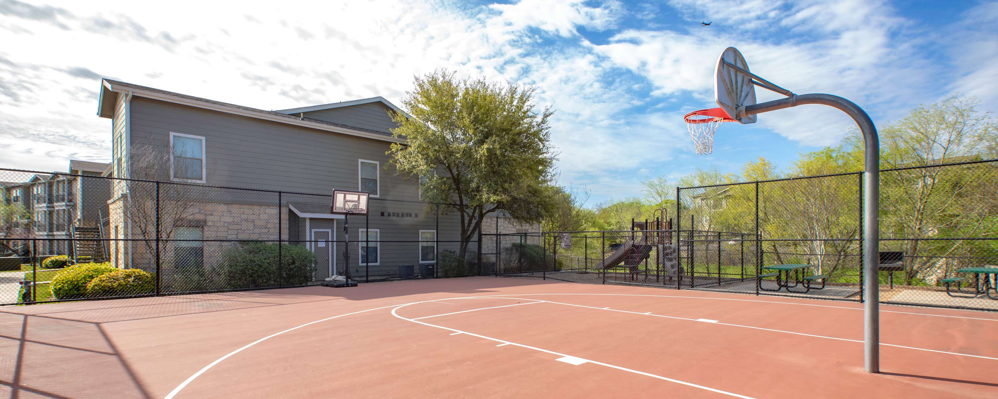 Our Apartments in Universal City, Texas offer an Outdoor Basketball Court