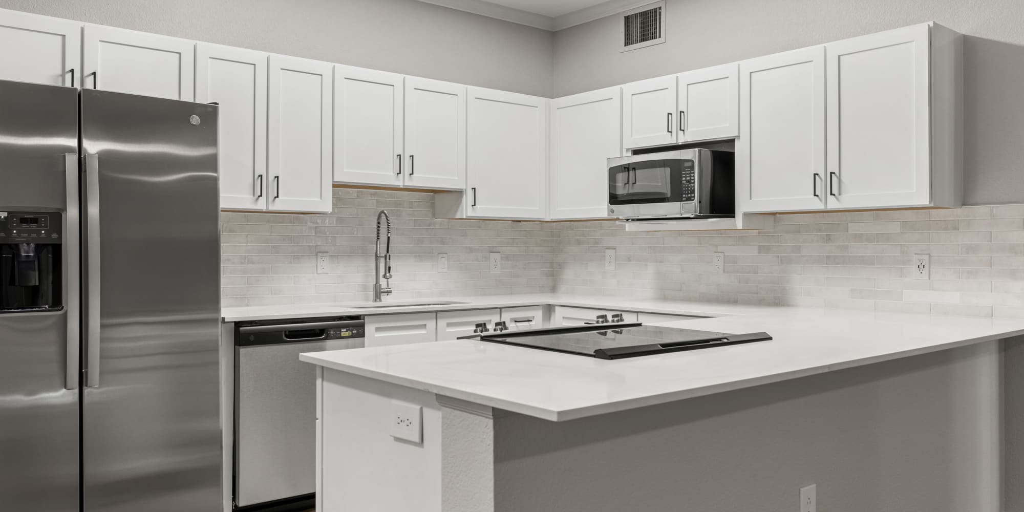 Newly Renovated Kitchen and Huge Breakfast bar at Briargate on Main in Parker, Colorado