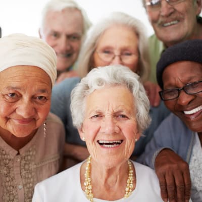 A diverse group of residents at AgeWell Living