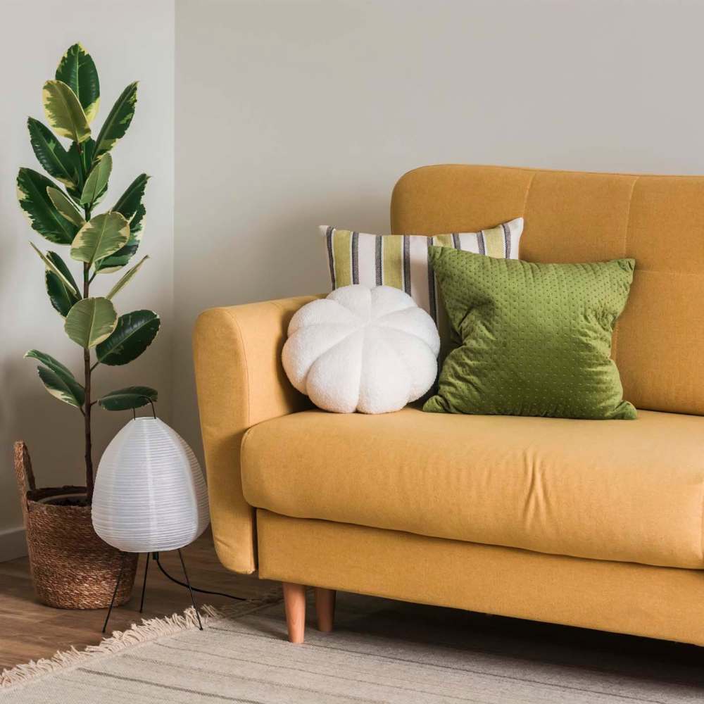 Living rom with soft sofa at Oakcrest South in El Campo, Texas
