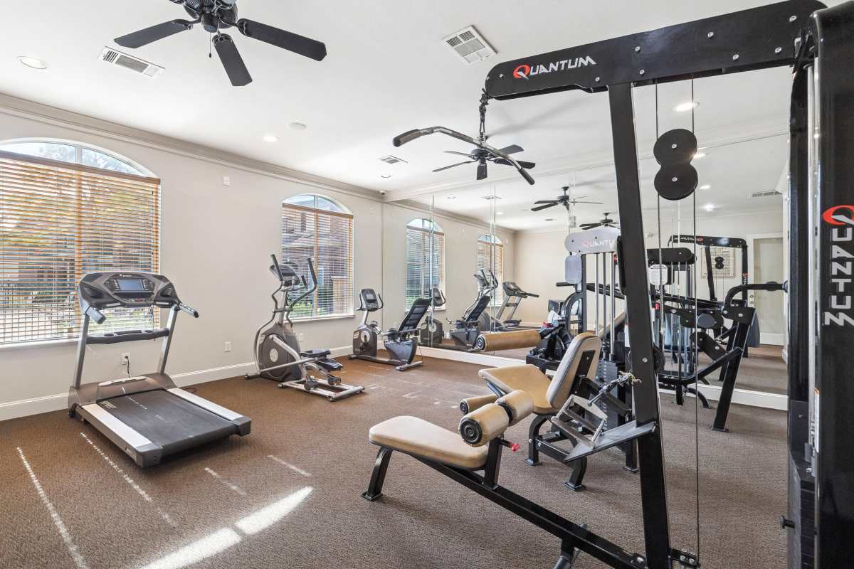 Fully-equipped fitness center at Bristol Apartments in Houston, Texas