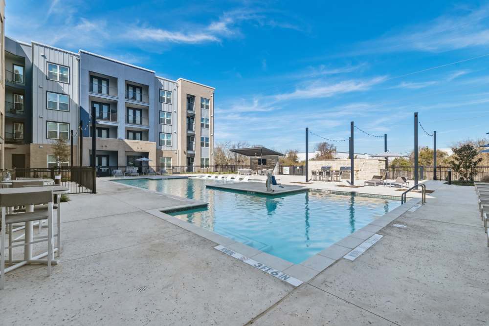 Happy residents at One90 Gateway apartments in Plano, Texas