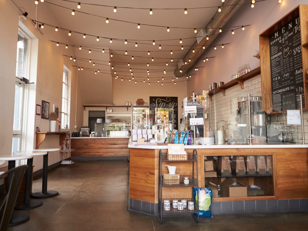 Welcoming coffee shop with cool string lights going across the ceiling near Alley South Lake Union in Seattle, Washington