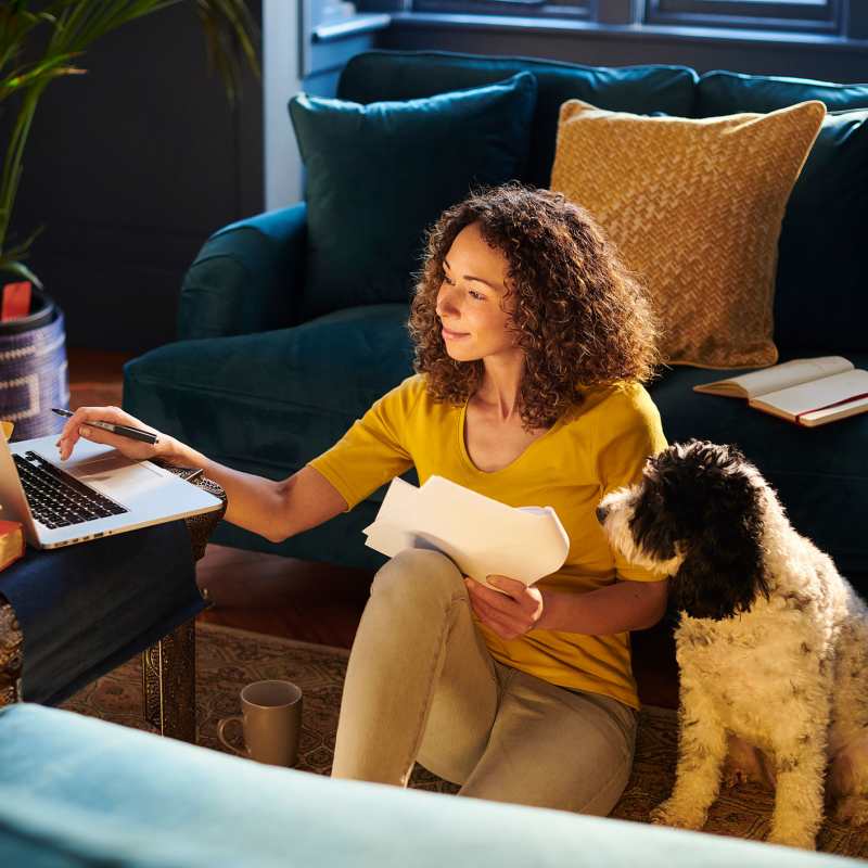 Resident in her home with her dog at Attain at Towne Centre, Fredericksburg, Virginia