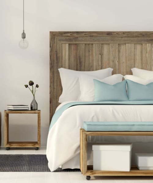 Modern bedroom with a area rug at Merida in San Antonio, Texas