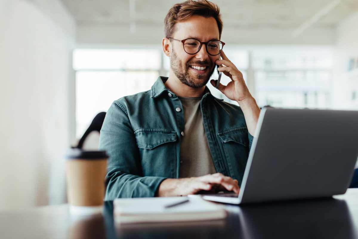 Resident using their laptop at Flats at Mount Zion in Stockbridge, Georgia