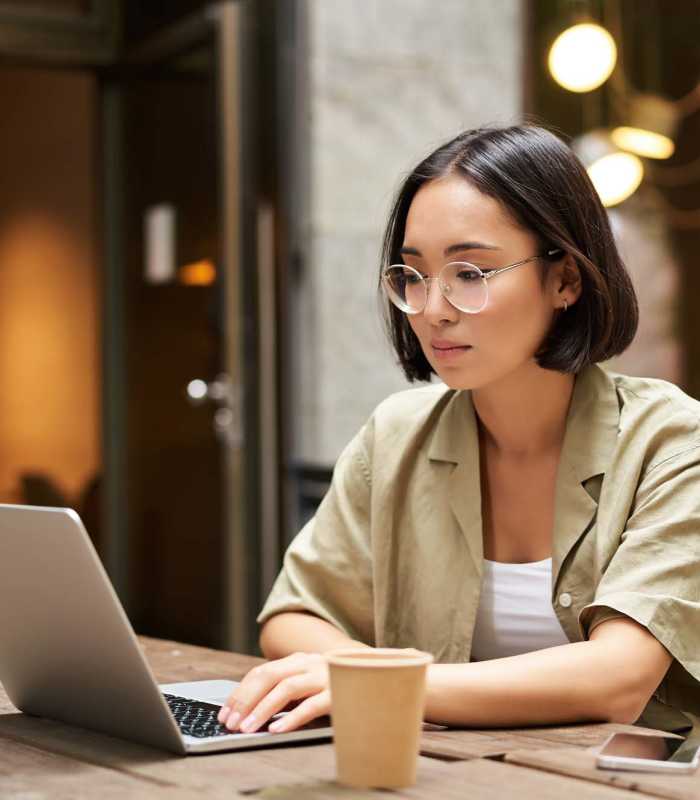 Resident using online resident portal at Gallatin Flats in Gallatin, Tennessee