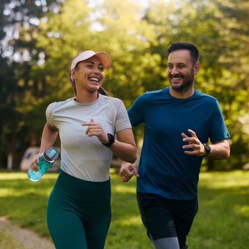 Residents running in local park near Adagio at Westshore Palms in Tampa, Florida