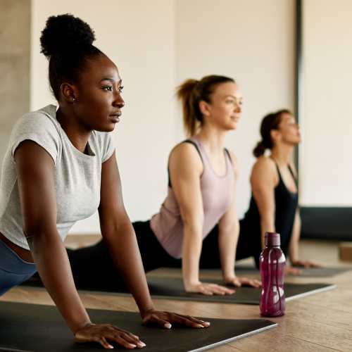 Residents doing yoga in the yoga studio at Altura in Phoenix, Arizona