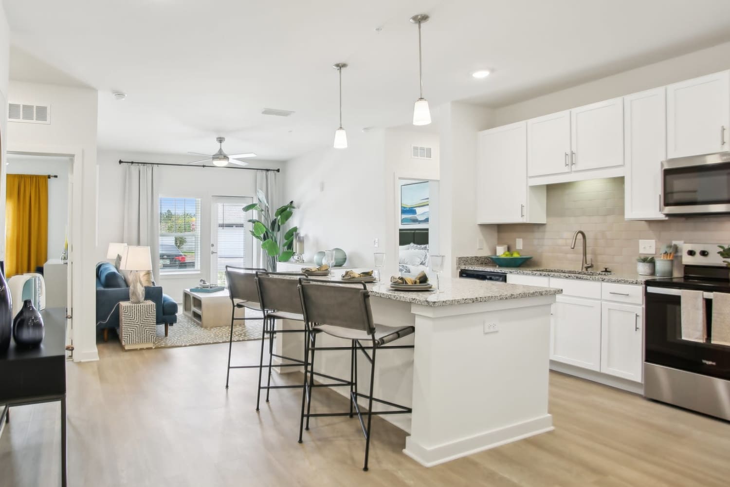 Living and dining area in our  model at Avion Apartments in Jacksonville, Florida