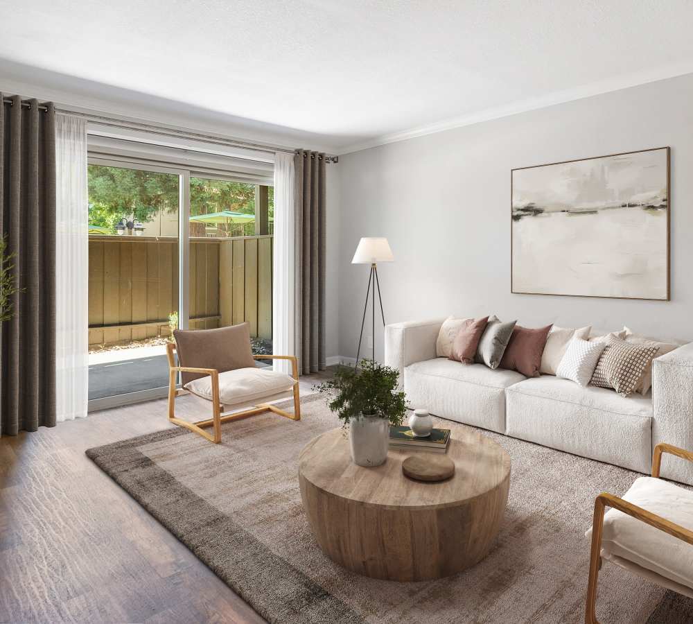 Living room with sliding doors and patio at Flora Condominium Rentals in Walnut Creek, California