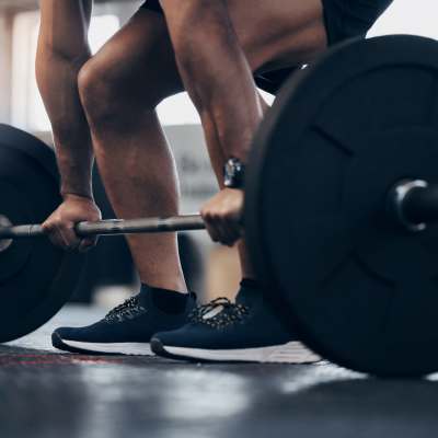 Resident Lifting weights in the gym at The Kensington in Charlotte, North Carolina