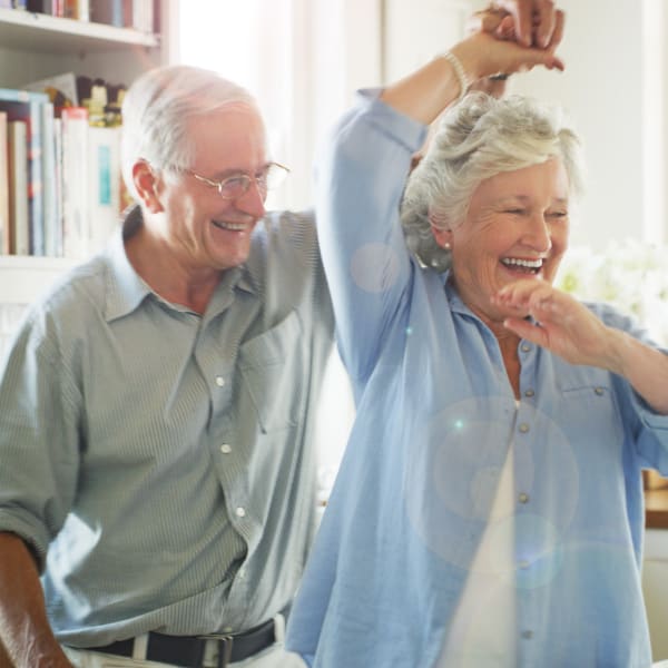 Residents dancing at Chesapeake Place Senior Living in Chesapeake, Virginia.