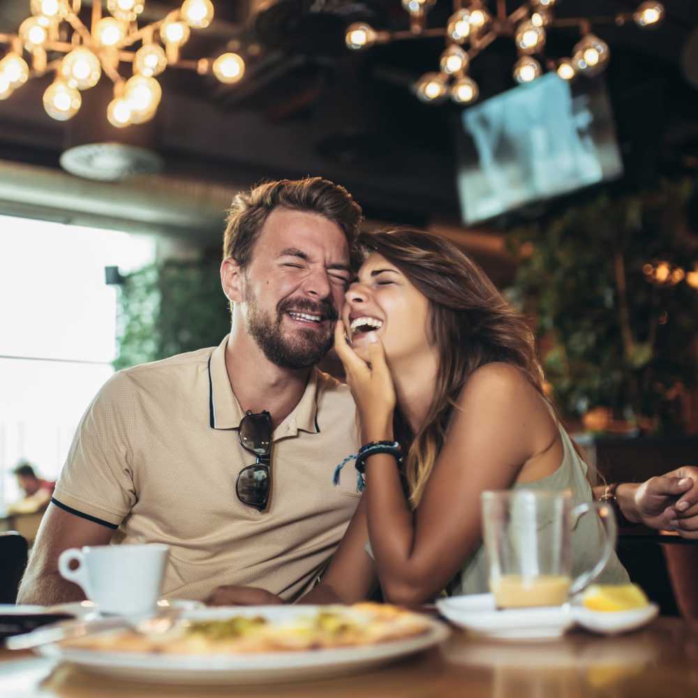 Couple dining in restaurant near Oaks Pentagon Village in Edina, Minnesota