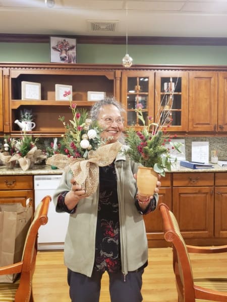 A Gilroy (CA) residents shows off her handmade bouquets! 