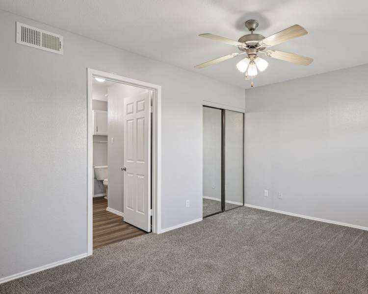 Living room with carpet at Raintree in Lake Jackson, Texas