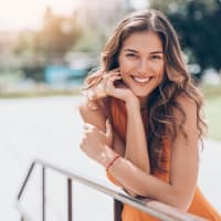 Smiling resident at The Presidio in Pensacola, Florida