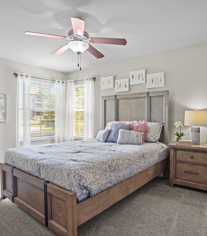 Spacious carpeted bedroom at Villas at Aspen Park in Broken Arrow, Oklahoma