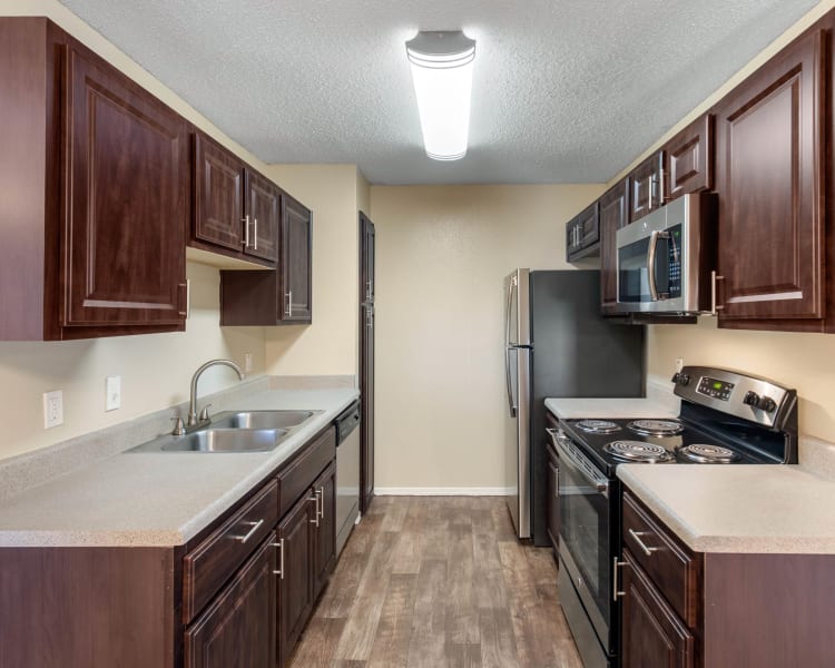 Spacious kitchen with plenty of counter space at The Logan in Bedford, Texas