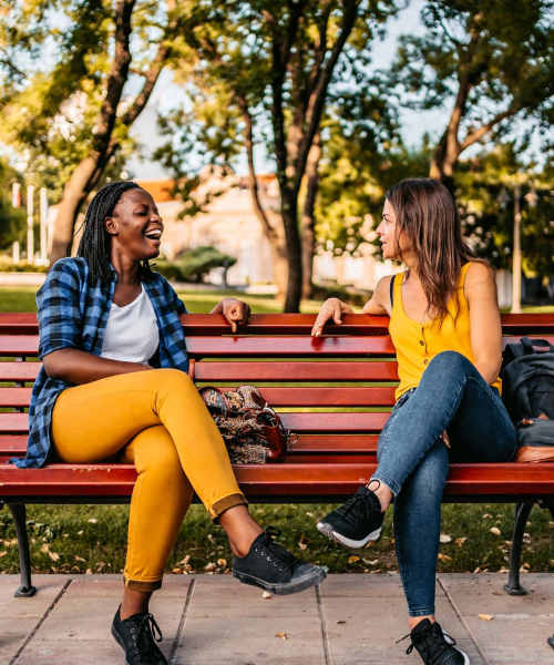 Resident women having a chat at a park near District at 54 in Raleigh, North Carolina