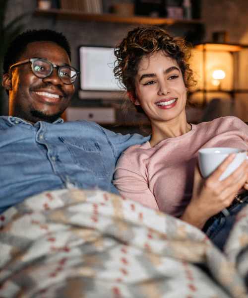 A couple watching tv at Virginia Junction in Baden, Pennsylvania