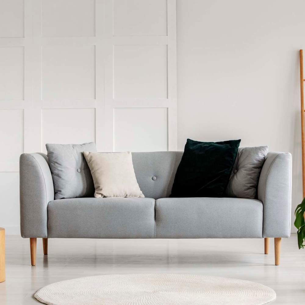 Living room with couch at Henderson Place in Atlanta, Georgia