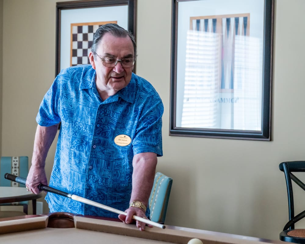 A resident plays pool at Harmony at West Ashley in Charleston, South Carolina
