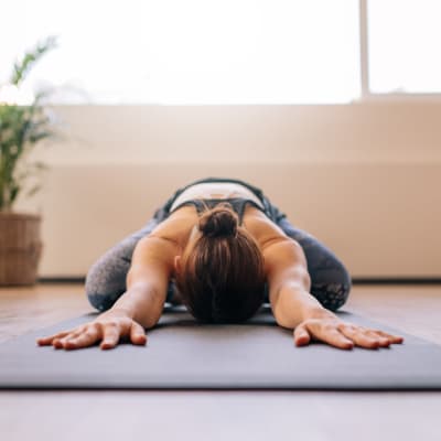 Resident doing yoga at Altura in Pensacola, Florida