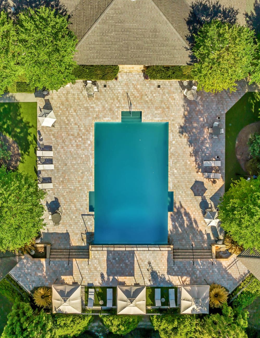 Aerial view of the community swimming pool at Adrian On Riverside in Macon, Georgia