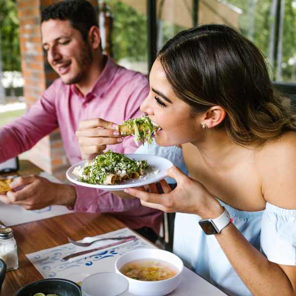 Residents having their favourite food near Northampton Village Apartments in Indianapolis, Indiana
